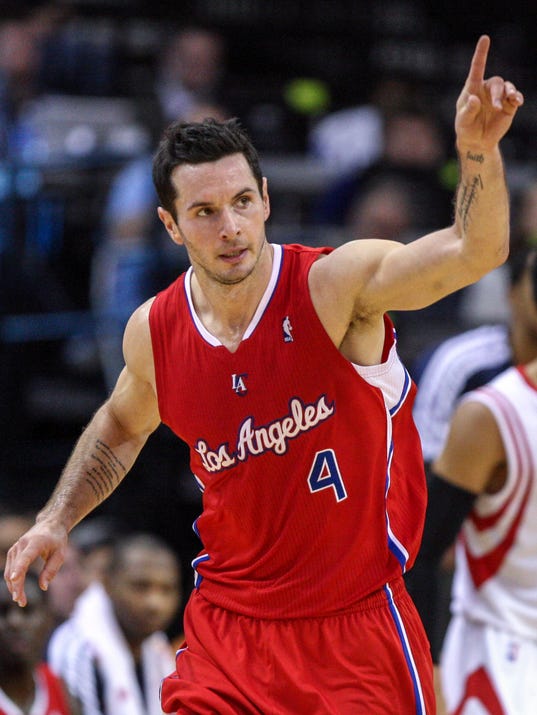 Clippers shooting guard J.J. Redick signals to the bench. (Photo: Troy ...