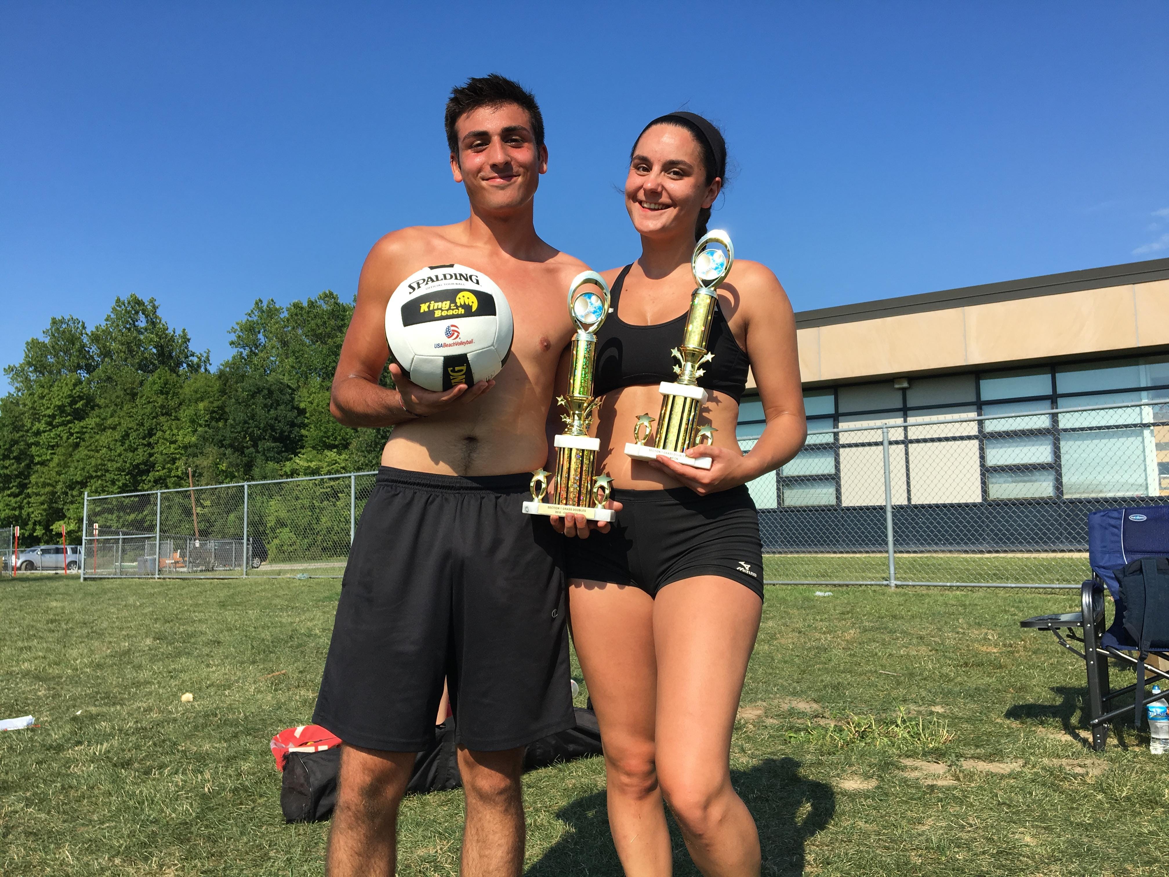 Mamaroneck alum Andreo Otiniano, left, and Yonkers senior Nicole Frascati won the annual Section 1 grass doubles tournament at Walter Panas High School on Saturday.