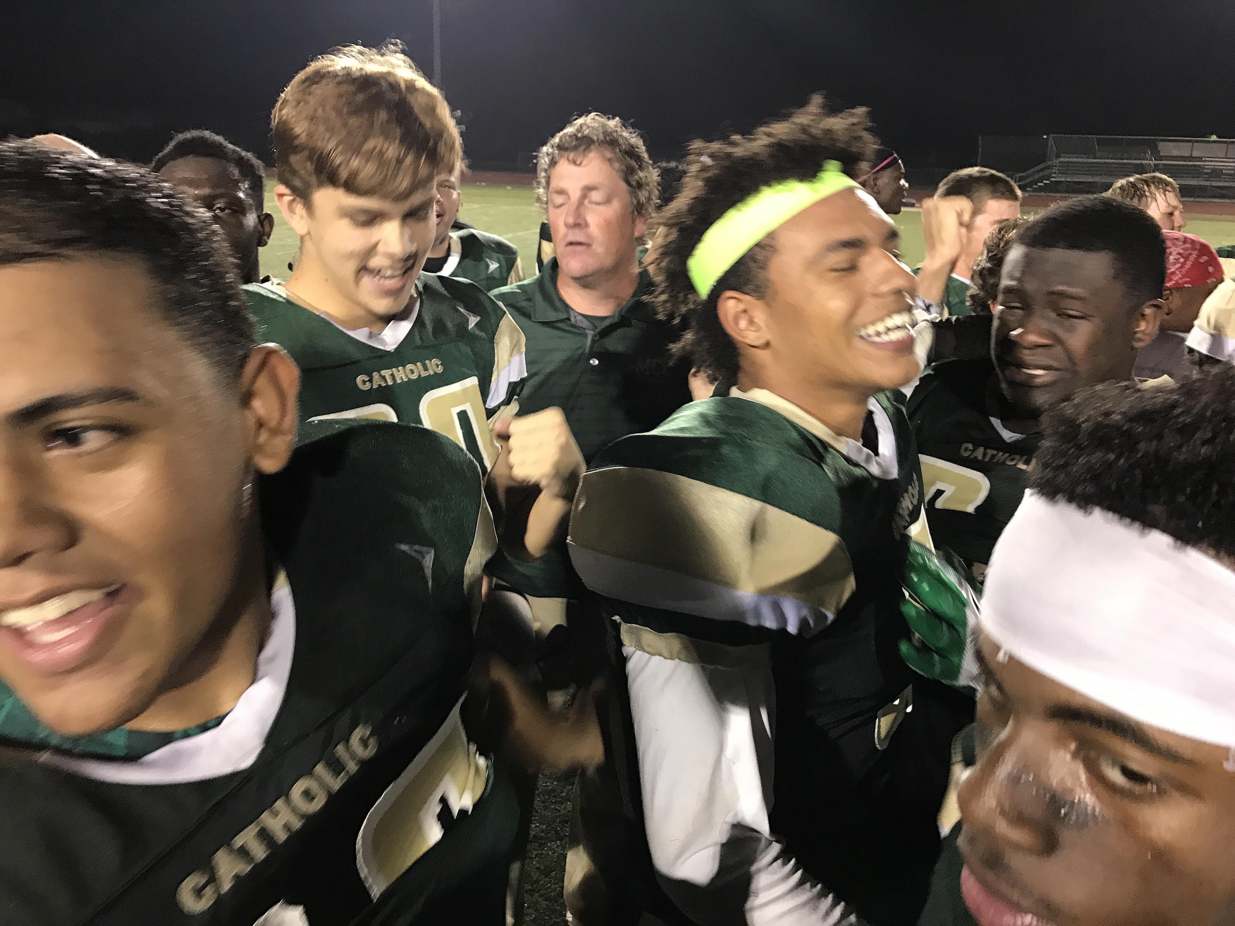 Melbourne Central Catholic players celebrate their nine-overtime victory over Clearwater Central Catholic.
