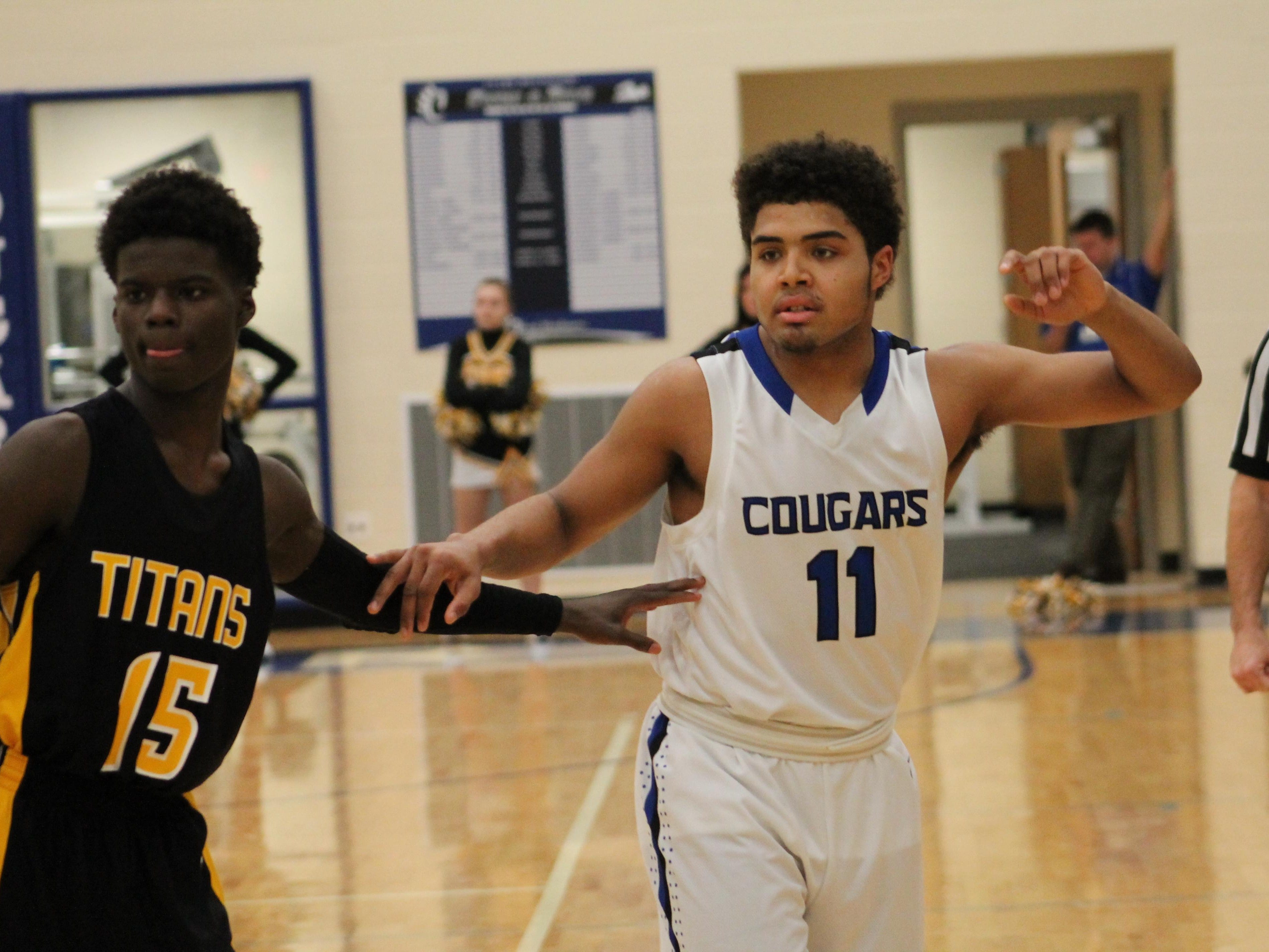 Clark Montessori’s Micah Blythe (11) works to get open against St. Bernard.