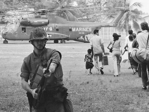 U.S. Marines provide cover during Operation Eagle Pull