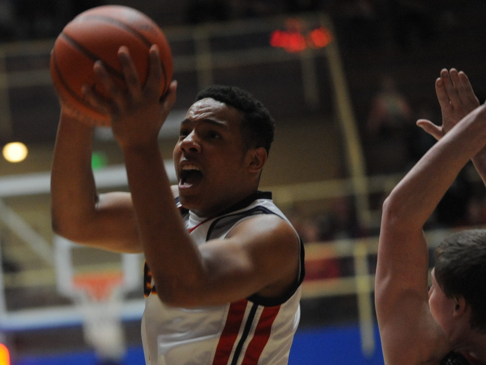 Desmond Bane of Seton Catholic goes for a shot during the Class A Frankfort Regional semifinal Saturday, March 12, 2016.