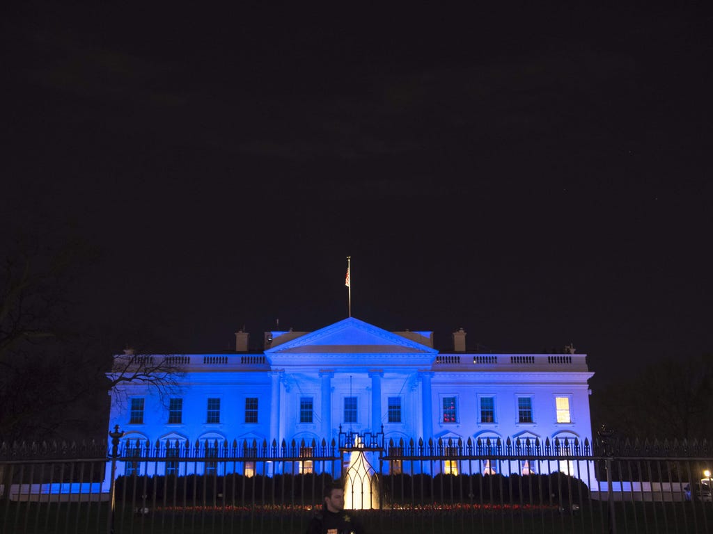 The White House is lit in blue in honor of World Autism Awareness Day in Washington.