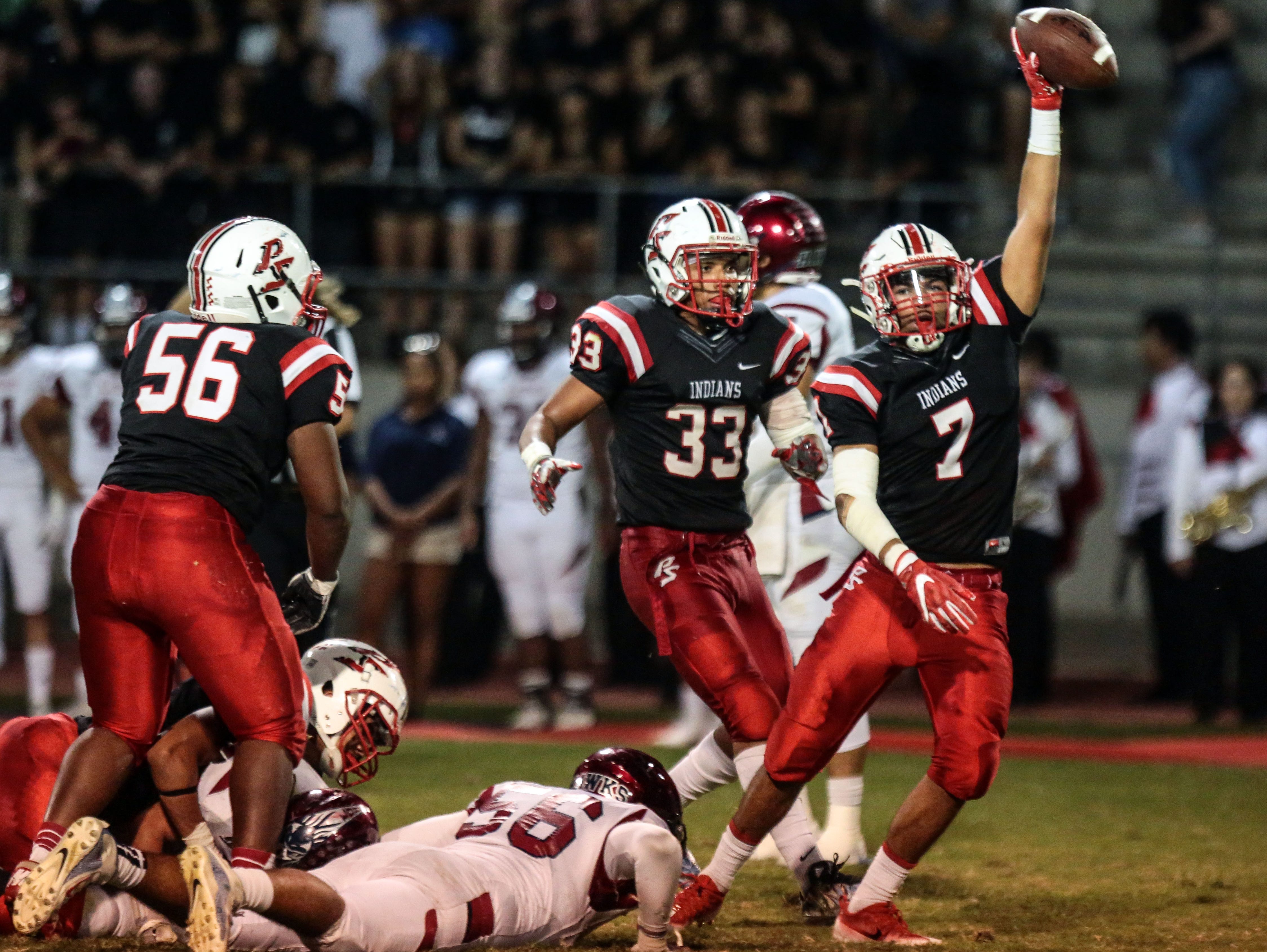 Palm Springs Frankie Kidd picks up a La Quinta fumble in the last seconds of the first half on Friday, September 30, 2016 in Palm Springs.