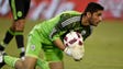 Mexico's Jesus Corona (1) scoops up the ball in the