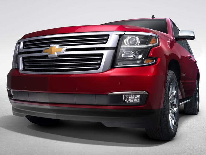 Chevrolet gave the front of the 2015  Tahoe a sleeker look. The new color is called crystal claret. The big SUV goes on sale first quarter next year.