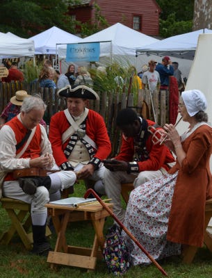 1st Battalion New Jersey reenactors relax at their