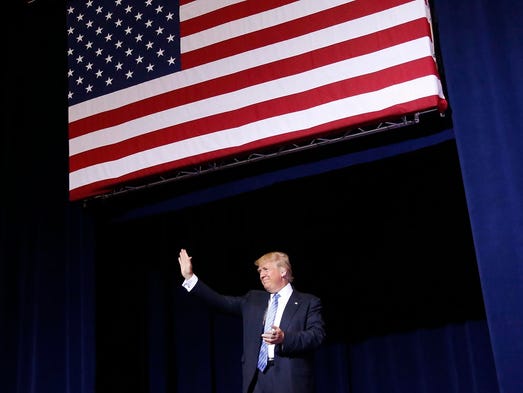 Trump arrives for his immigration speech at the Phoenix