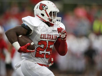 Colerain junior fullback Monalo Caldwell has rushed for 1,276 yards and 18 touchdowns for the Cardinals this season.