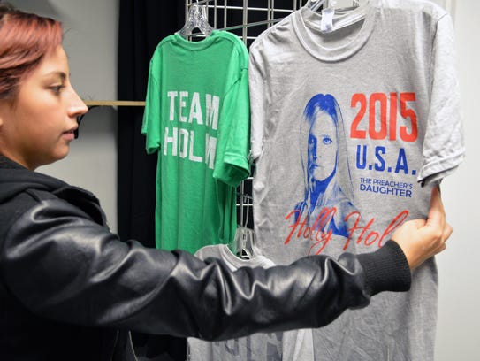 Deanna Bentacu, 22, stocks up on T-shirts of new UFC