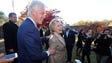 Former President Bill Clinton and Hillary Clinton greet