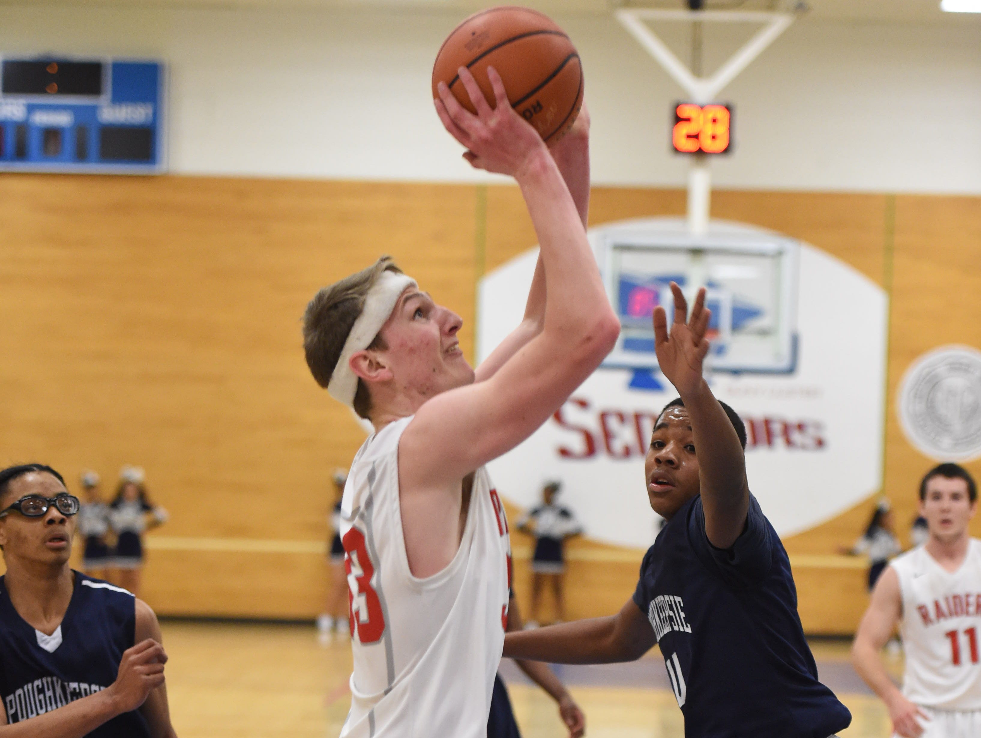 Red Hook High School's Colin Bemis takes a shot against Poughkeepsie in the Mid-Hudson Athletic League semifinals on Feb. 17 at SUNY Ulster.
