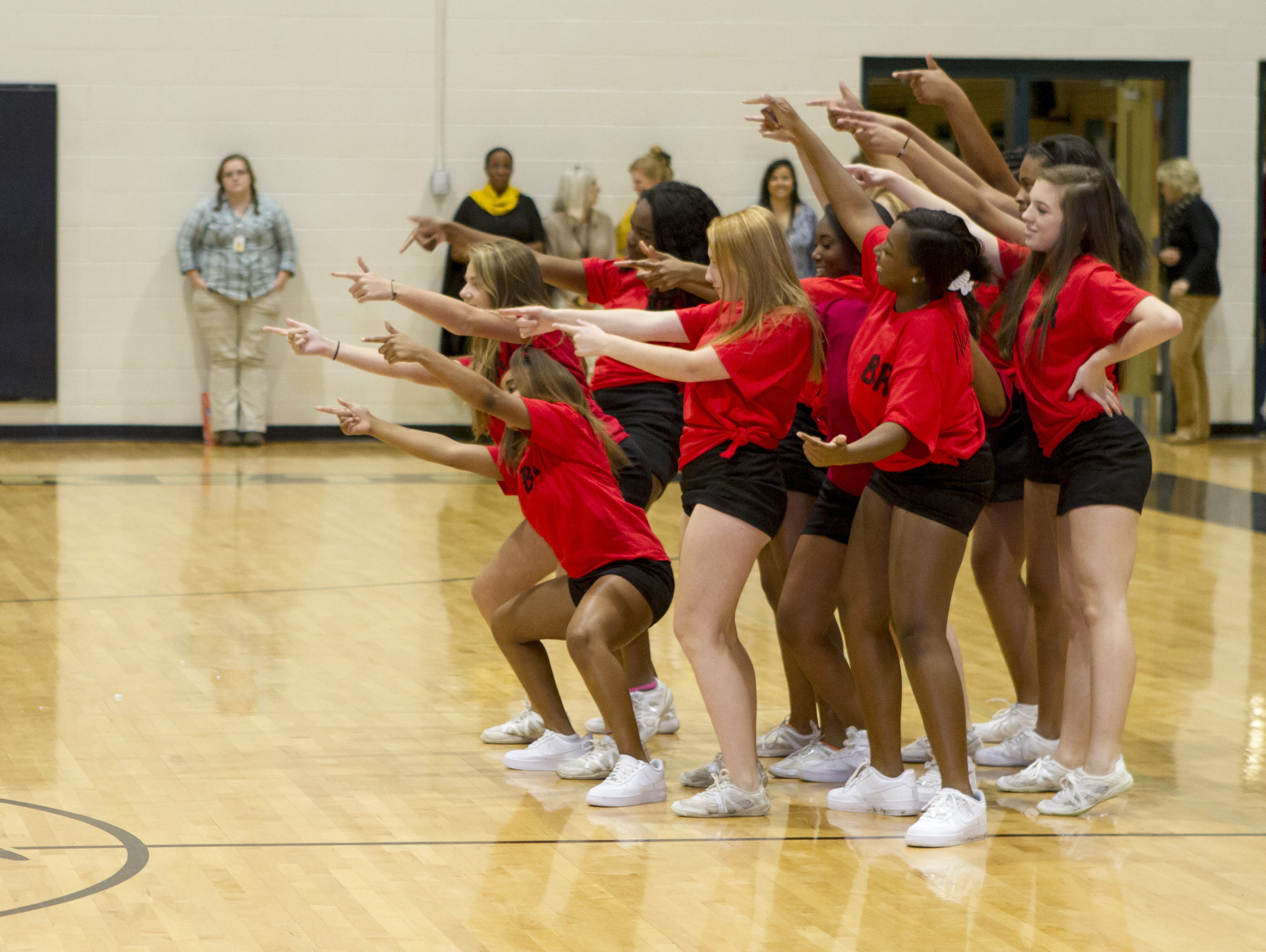 The competition in the dance-off fight back. The Greer High School cheerleaders performed a skit at its pep rally leading up to the Blue Ridge High School football game.