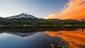 Wondrous Washington: A summer sunset illuminates clouds over Mt. Rainier, with the placid water of Reflection Lakes in the foreground. The photo was submitted to USA TODAY via Your Take at yourtake.usatoday.com