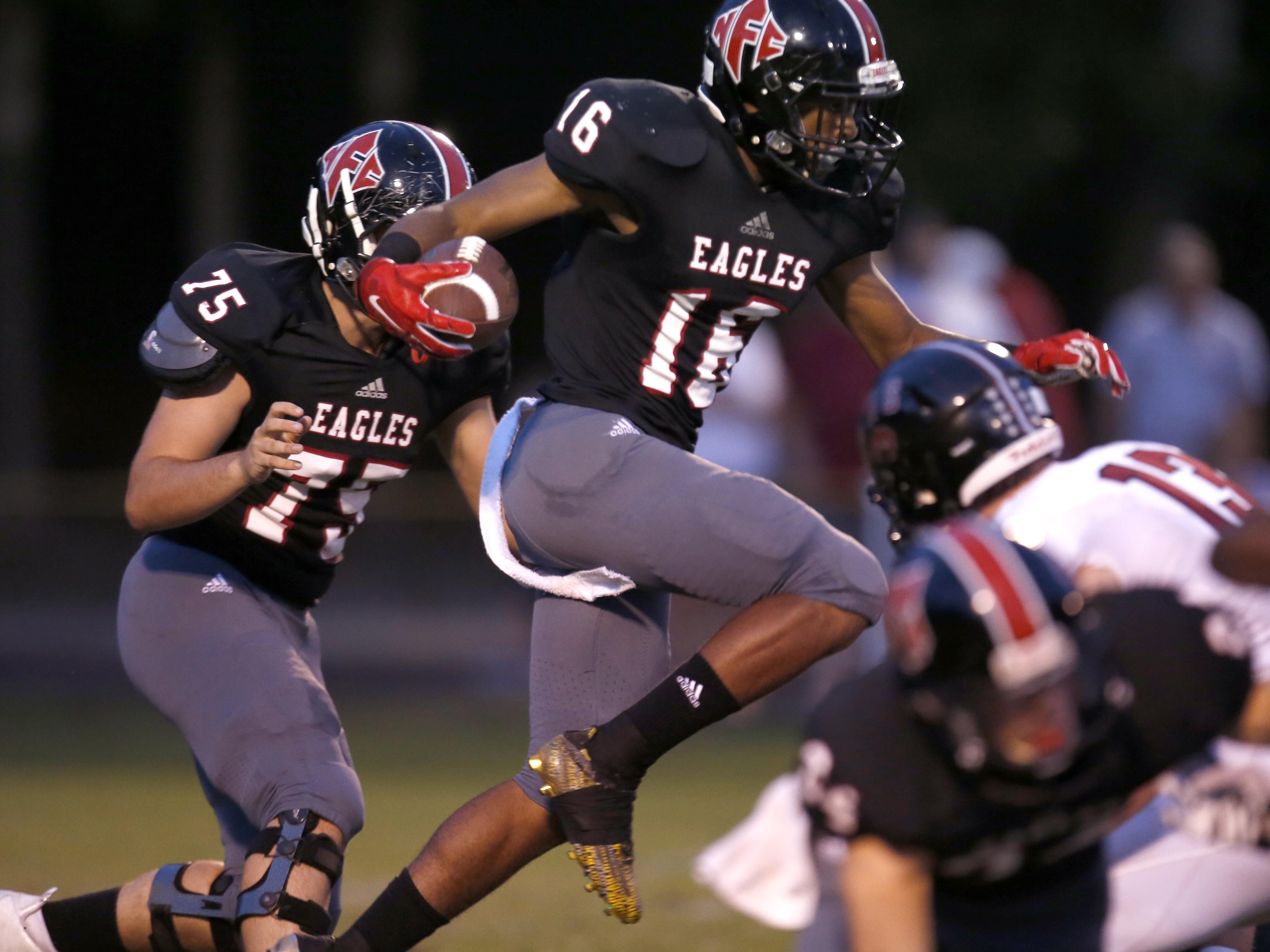 NFC's Korey Charles attempts to leap a Chiles defender during their game at NFC High School on Friday.