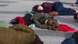 Abortion opponents participate in a "die-in" in front