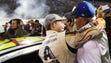 Jeff Gordon hugs Rick Hendrick after the 2015 Ford