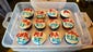 Cupcakes are seen with the names of candidates, made