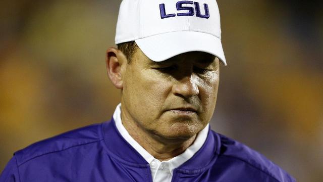 Image result for LSU fires head coach Les Miles, OC Cam Cameron