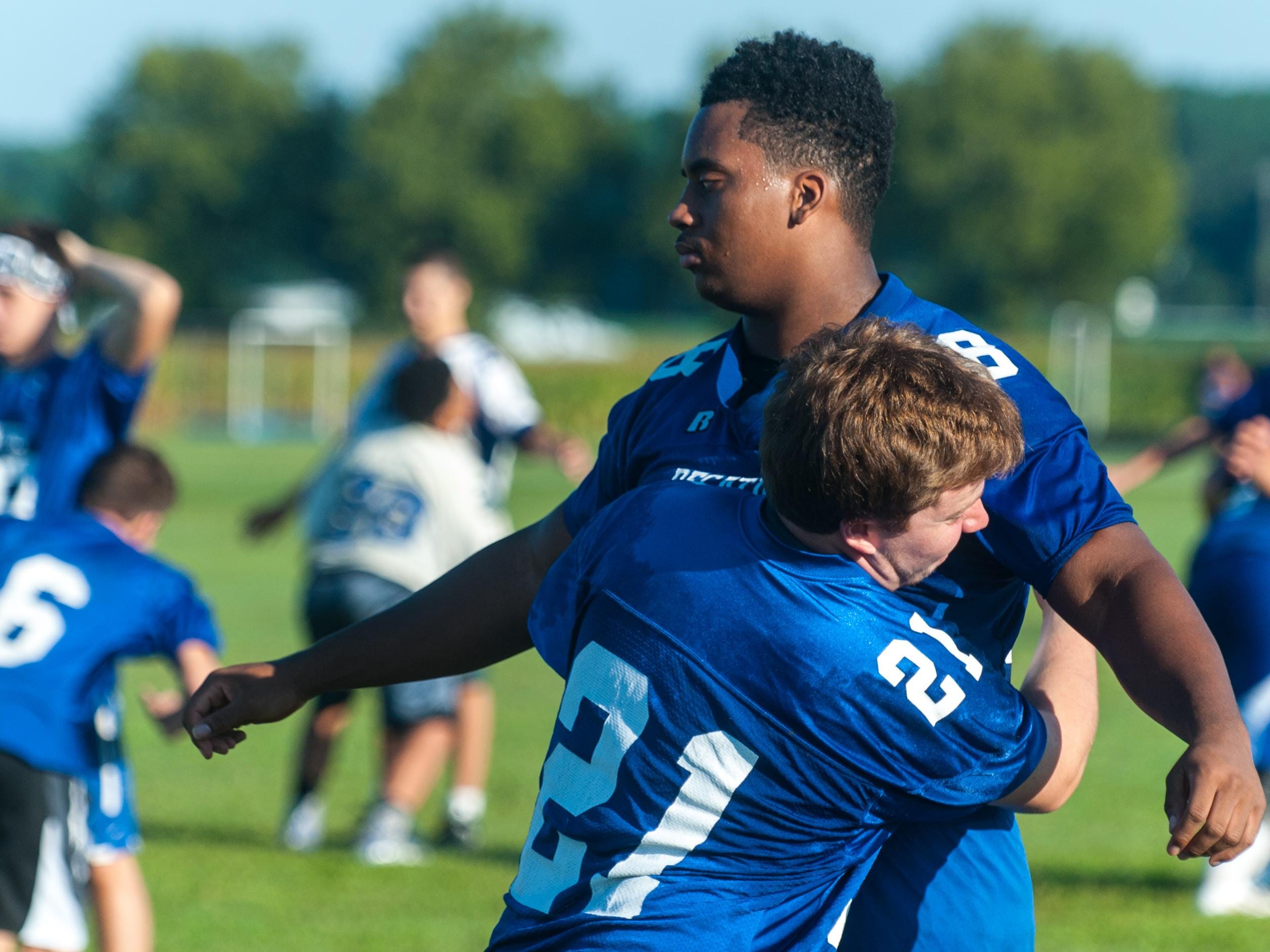 Stephen Decatur works on heads up tackling during practice on Friday morning.