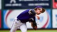 Johnston pitcher Nathan Buckallew (1) releases a pitch