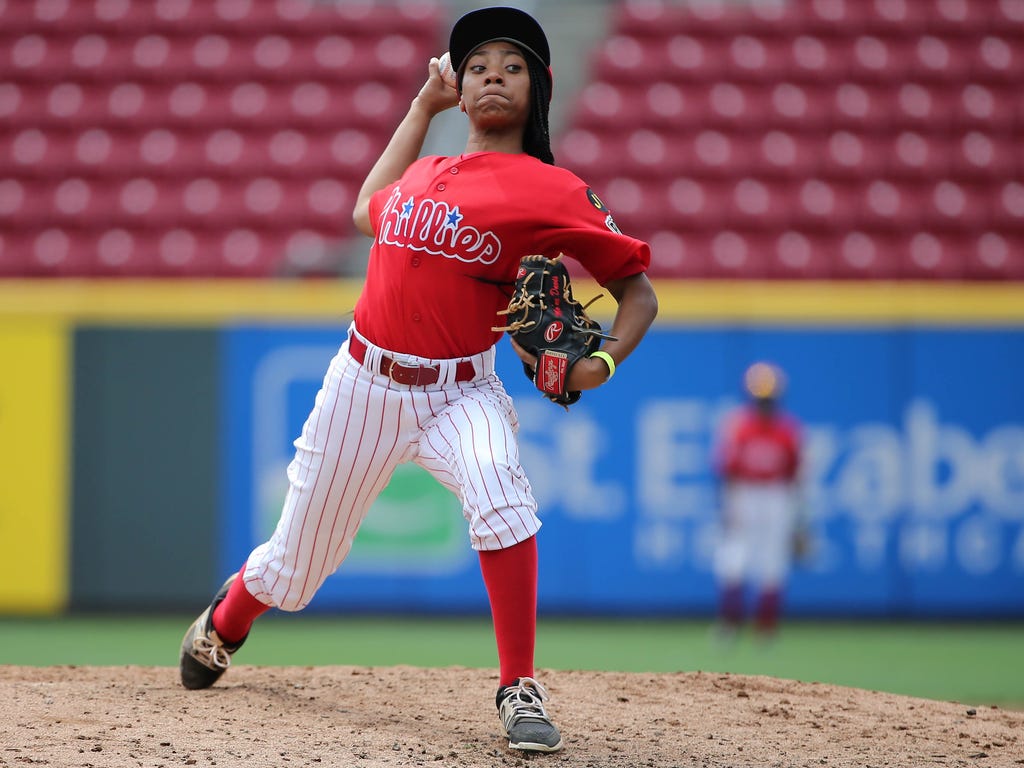 Phillies RBI pitcher Mo'ne Davis pitches in the fourth inning during regional play of the 2017 RBI World Series at Great American Ball Park in Cincinnati.