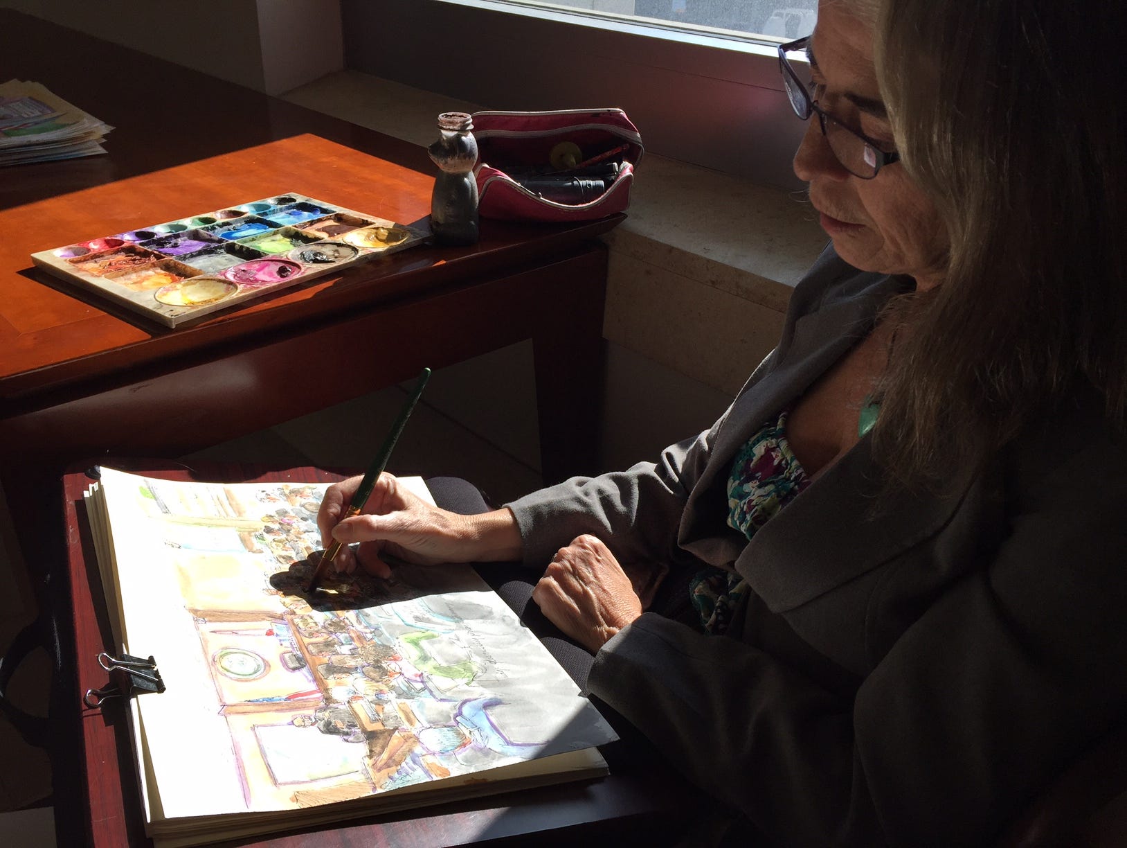 Courtroom artist Vicki Behringer finishes up a sketch at the Ellen Pao trial on March 25, 2015.