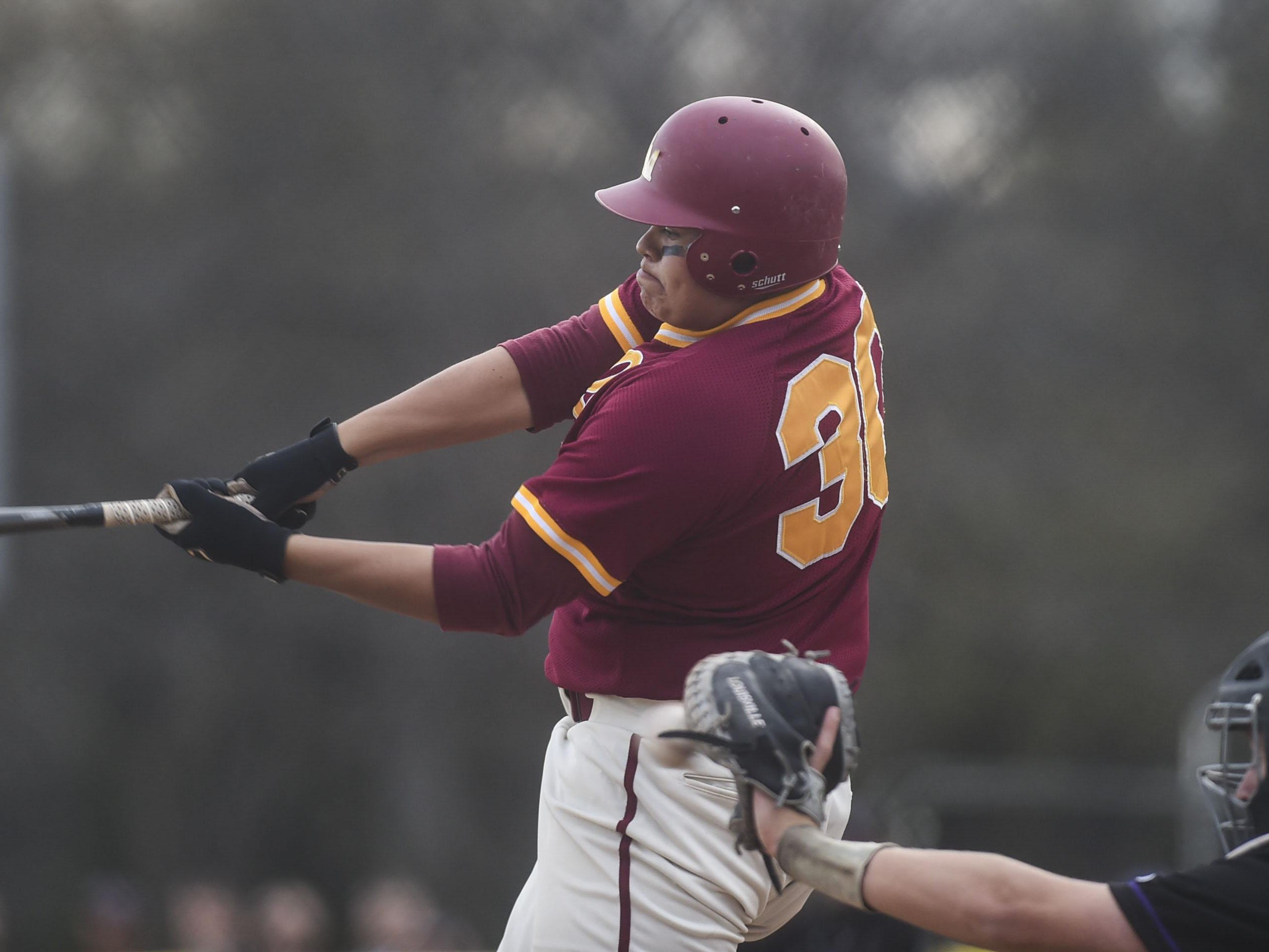 Rocky Mountain's Austin Alarid swings at a pitch in a game last season. The Lobos are ranked No. 5 in Class 5A.