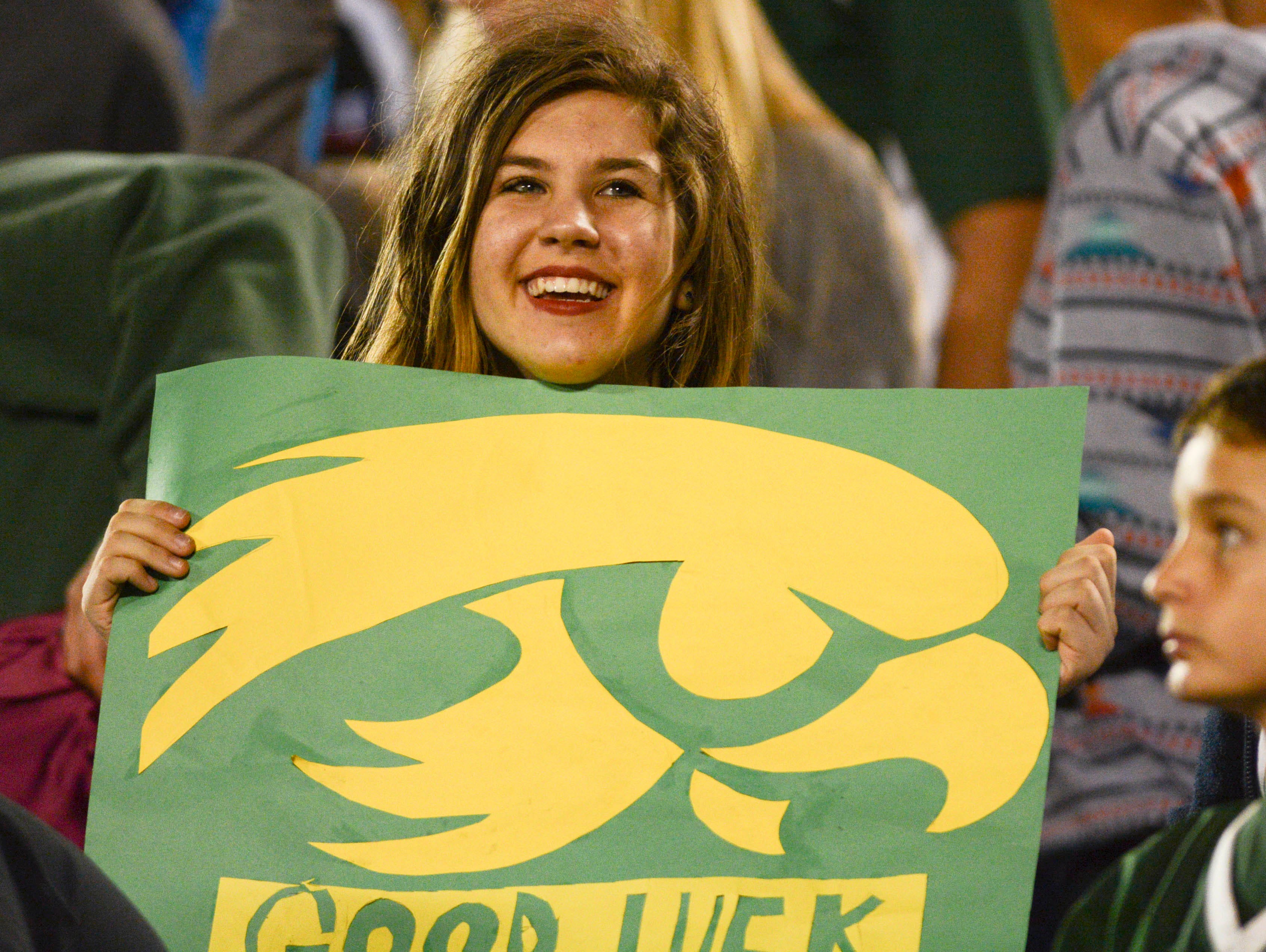 A Viera fan cheers for the Hawks during Friday's game.