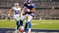 New York Giants wide receiver Victor Cruz (80) catches a touchdown pass against Dallas Cowboys cornerback Orlando Scandrick (32) in the fourth quarter  at AT&amp;T Stadium.