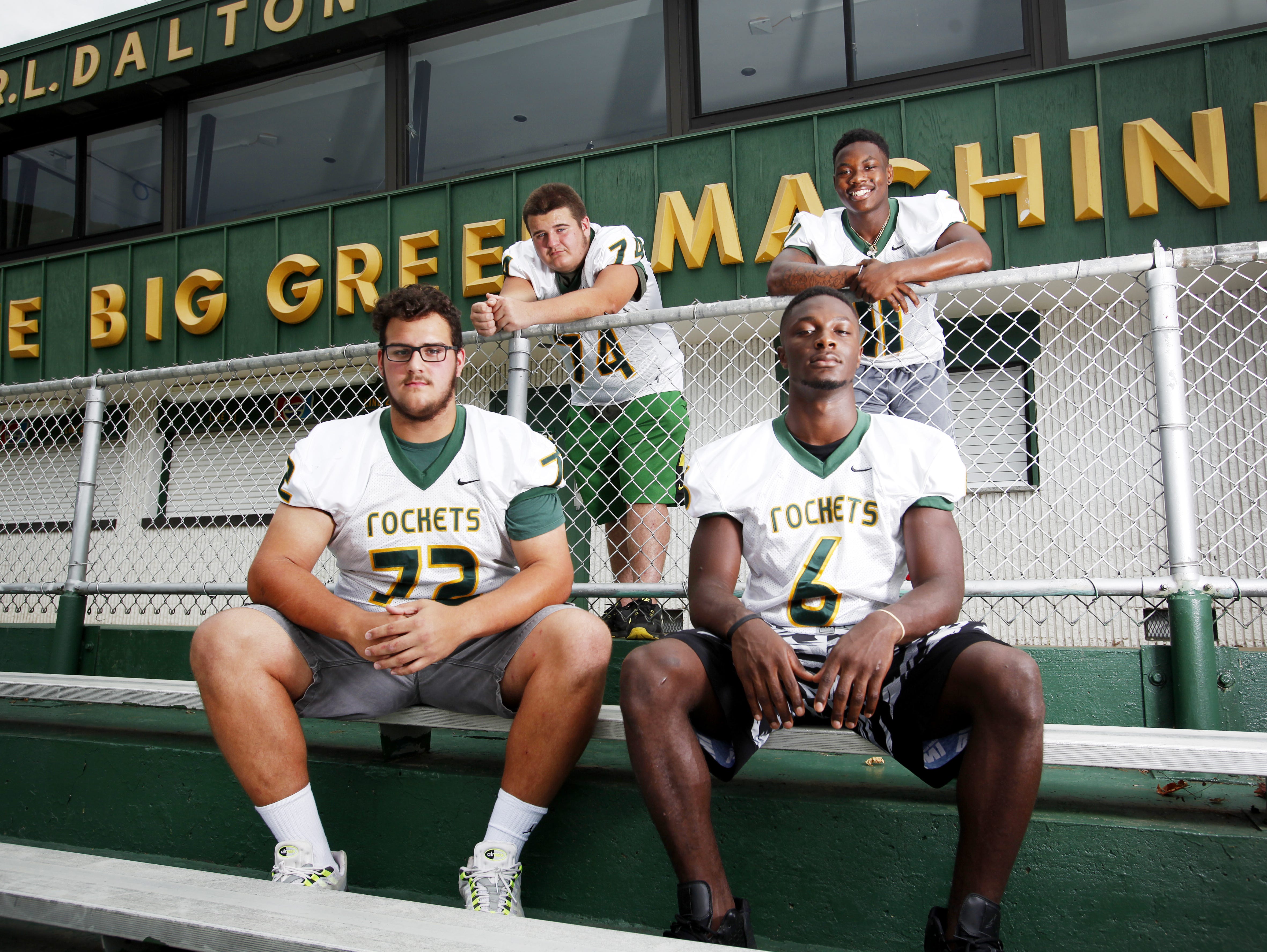 Reynolds football players, from left to right, Jake Setterlind, Kyle McWhirt, Sean Jones and Keyal Talbert.