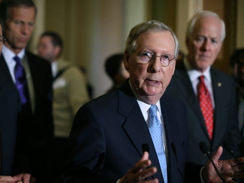 Senate Majority Leader Mitch McConnell, R-Ky., with Sen. John Cornyn, R-Texas, in the background.