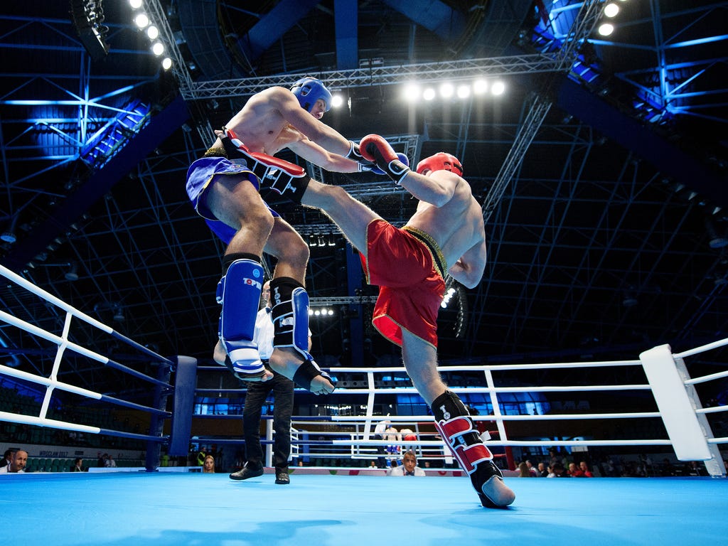 Aleksandr Dimitrenko, right, of Russia fights against Aleksandar Petrov of Bulgaria during the Invitation Sports Kickboxing Men's K1 81kg Quarterfinals of The World Games at the Orbita Hall in Wroclaw, Poland.