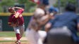 Rocky Mountain High School pitcher Austin Alarid delivers