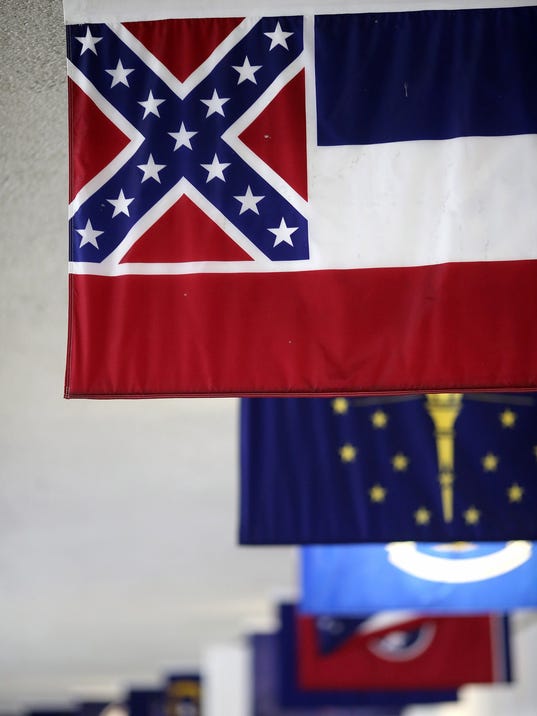 Mississippi State Flag Under Scrutiny Amid Calls For South Carolina To Take Down Confederate Flag Outside Its Capitol