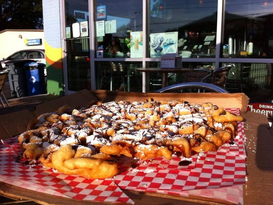 ... BuzzFeed for the restaurant's giant funnel cakes. (Photo