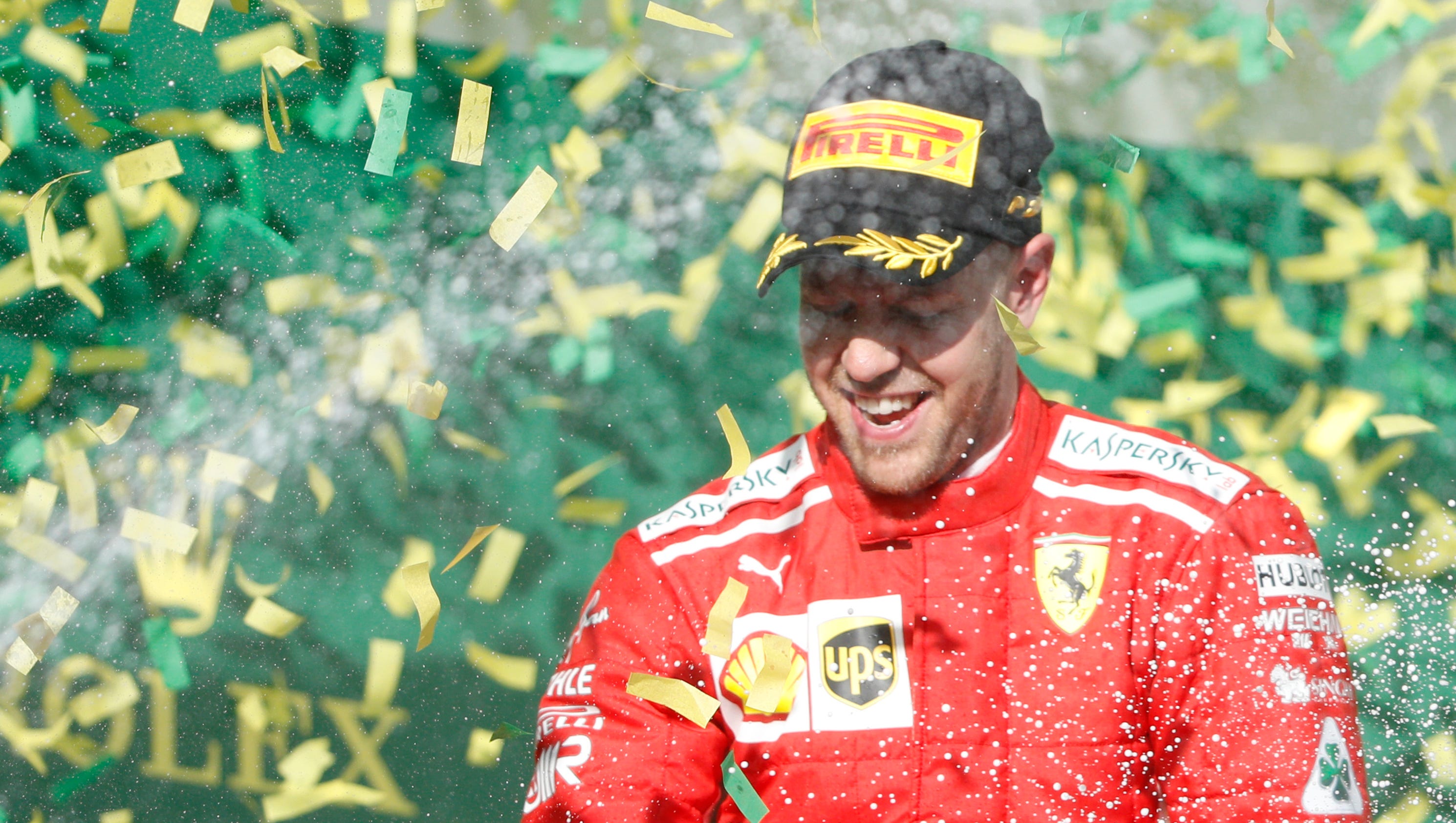 Sebastian Vettel holds off Lewis Hamilton to win Australian Grand Prix
