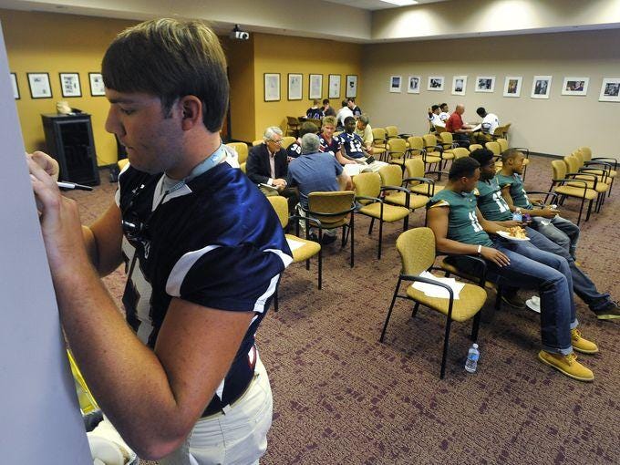 Former Montgomery Academy player Tyler Mitchell fills in a questionnaire last year at the Montgomery Advertiser High School Football Media Day. Mitchell signed with Kansas State in February. The Advertiser hosts its seventh Media Day Thursday.