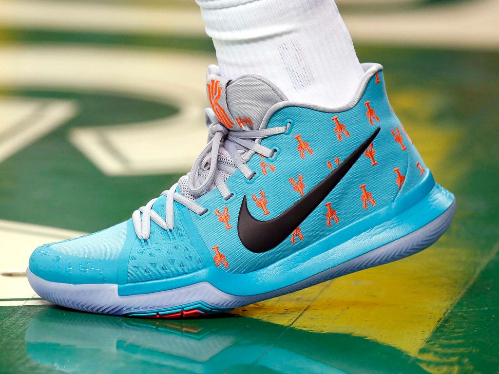 Lobsters are seen on Boston Celtics guard Kyrie Irving Nike shoes during the second half of Boston's 124-118 win over the Denver Nuggets at TD Garden.