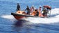 A fast-response craft manned by members from the ship ADV Ocean Shield searches the ocean for debris.