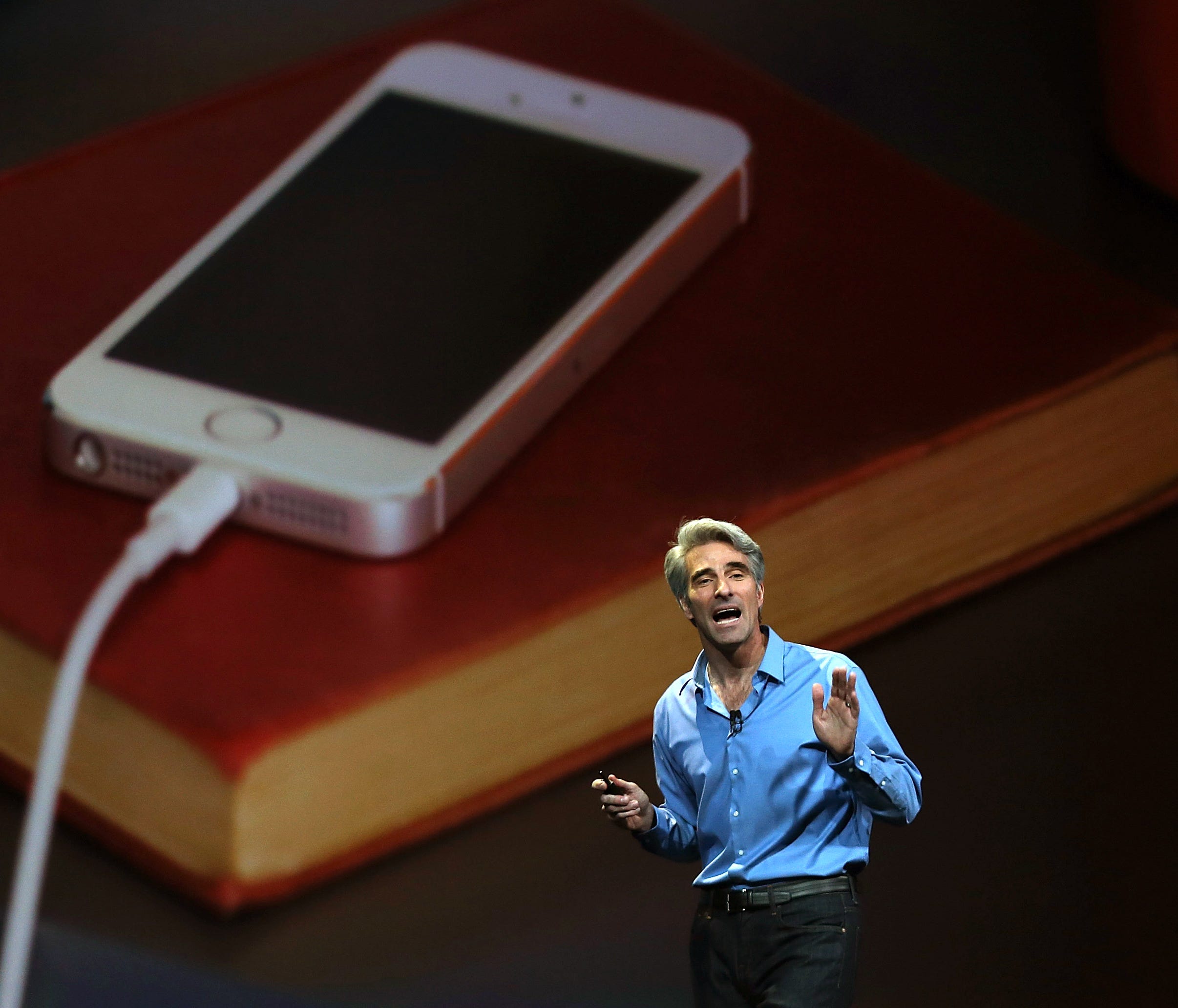 Apple Senior Vice President of Software Engineering Craig Federighi speaks during the Apple Worldwide Developers Conference at the Moscone West center on Monday in San Francisco.