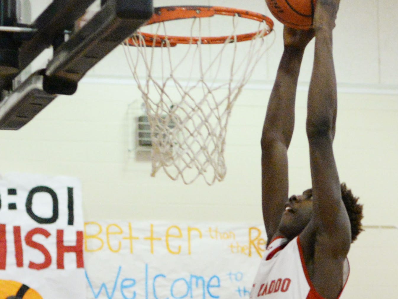 North Caddo's Chris Thomas goes up for a dunk in a 69-47 quarterfinal win over Episcopal last Friday.