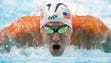 Michael Phelps swims during the men's 200-meter individual