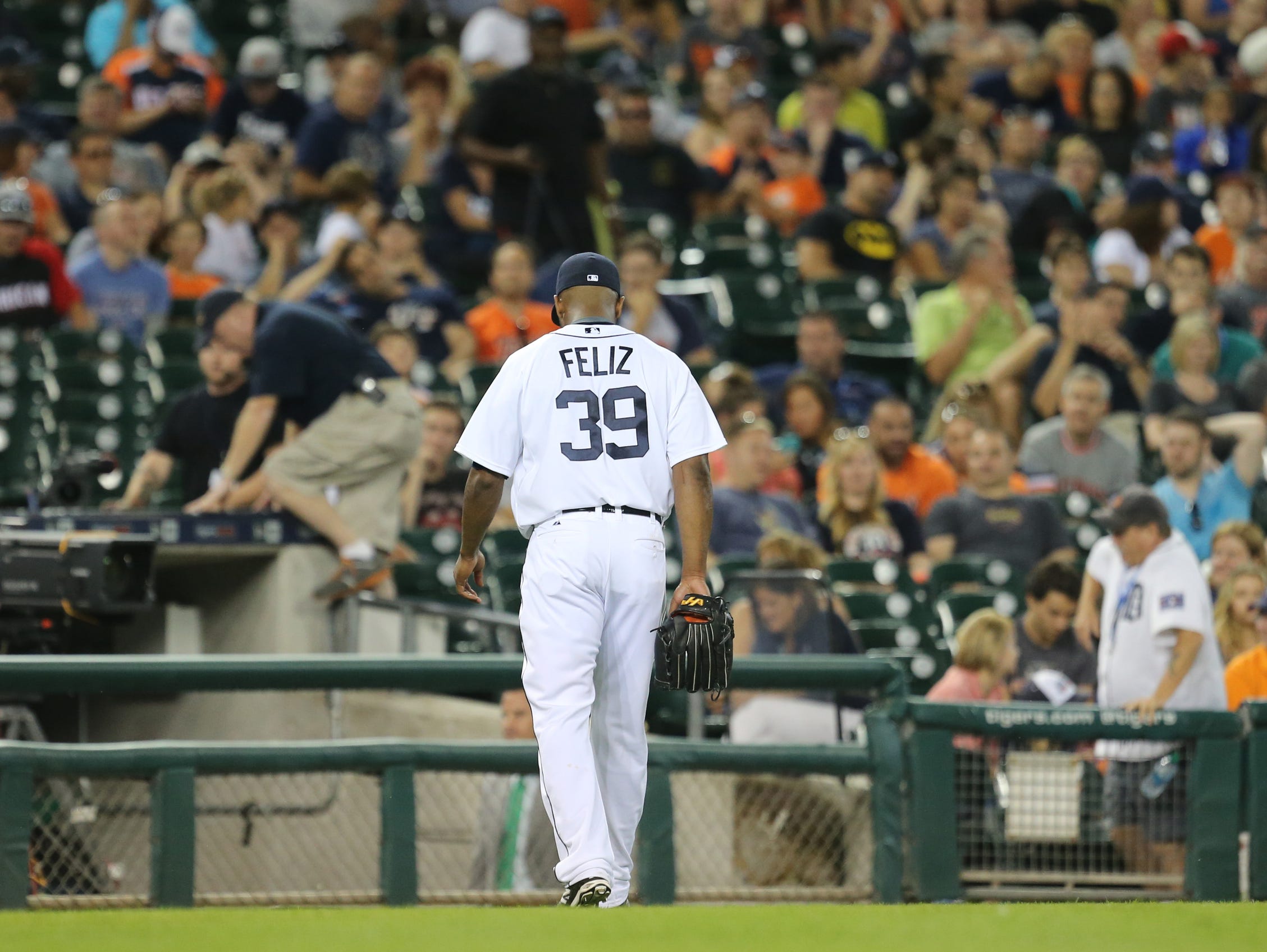 The Detroit Tigers' Neftali Felz walks off the field after giving up a grand slam to the Seattle Mariners Franklin Gutierrez during eighth inning action on Tuesday, July 21, 2015 at Comerica Park in Detroit.