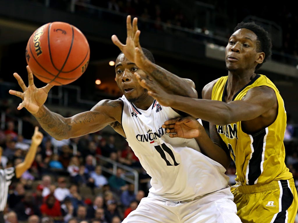 Cincinnati Bearcats forward Gary Clark grabs the ball against Alabama State Hornets forward Ed Jones in the second half at BB&T Arena in Highland Heights, Ky.