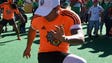 A member of Los Cheetahs freestyle team perform soccer