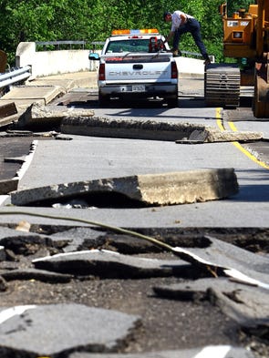 The flood damage to Tucker Road in North Nashville