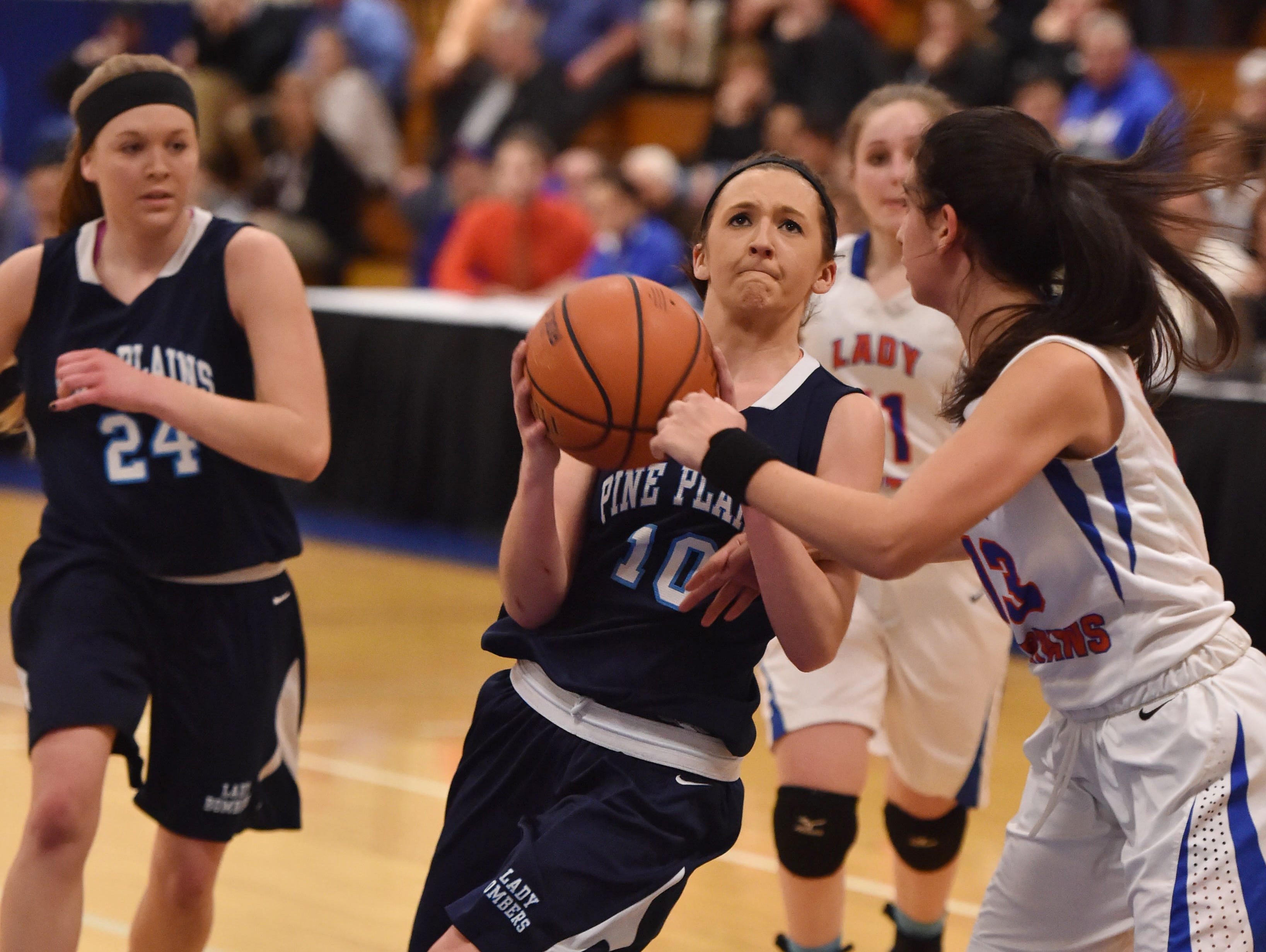 Pine Plains' Michaella Lamont drives to the basket during the Section 9 Class C final against S.S. Seward at Mount Saint Mary College in Newburgh on Feb. 25.