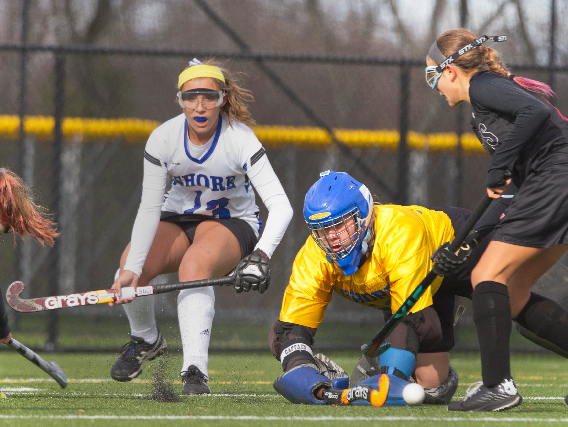 Shore Regional's Sarah Dwyer dives to block shots on goal during first half action, backed up by teammate Nicole LaMorte. Shore Regional defeats Haddonfield 3-0 in NJSIAA Group I State Final in Bordentown, NJ on November 14, 2015