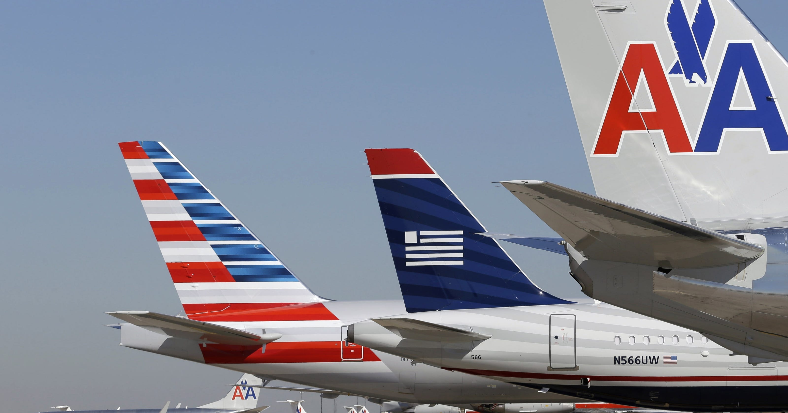 US Airways shareholders OK American Airlines merger